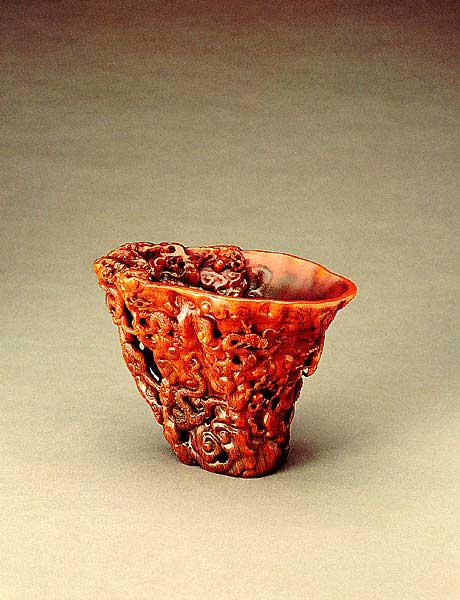 Rhinoceros horn libation cup carved with nine dragons in high relief
