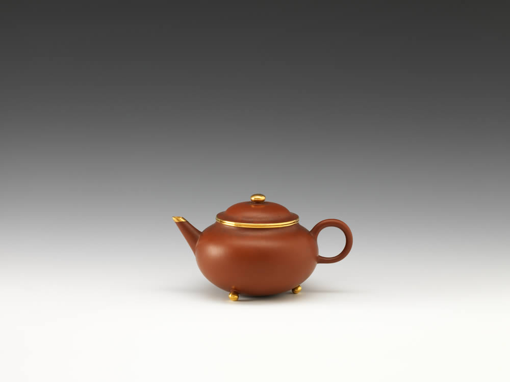 Export teapot of globular shape with gold mount