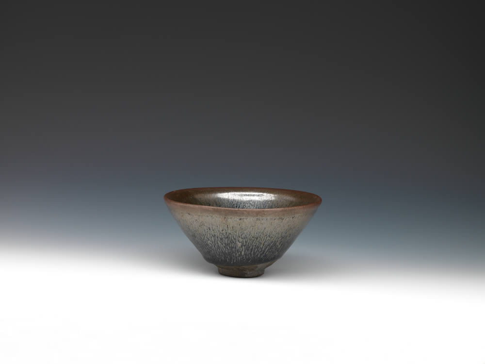 Tea bowl with hare's-fur russet markings in black glaze, Jian ware