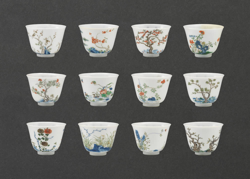 Twelve cups with representing flowers of the months in wucai enamels