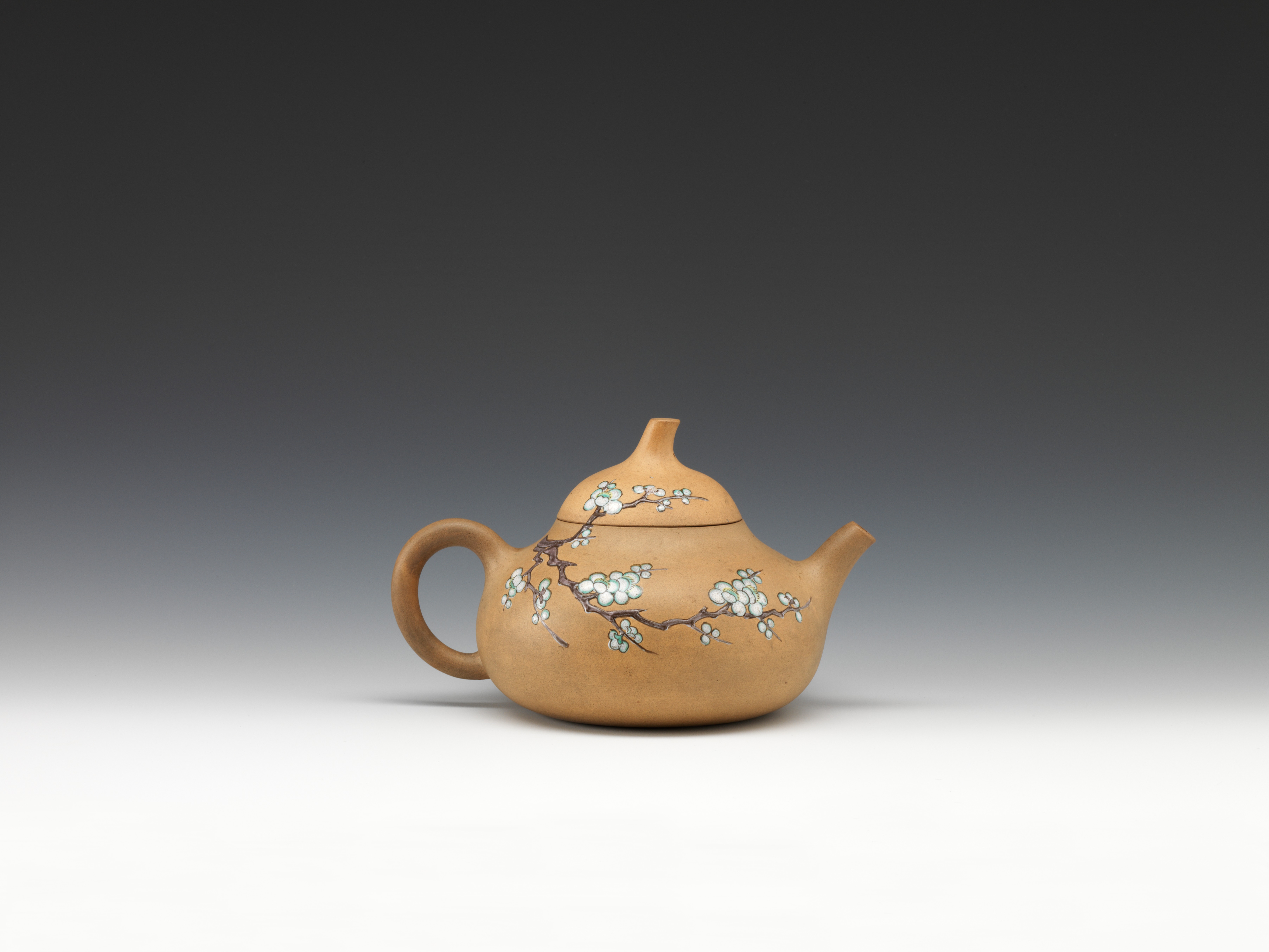 Teapot of gourd shape with prunus painted in famille-rose enamels