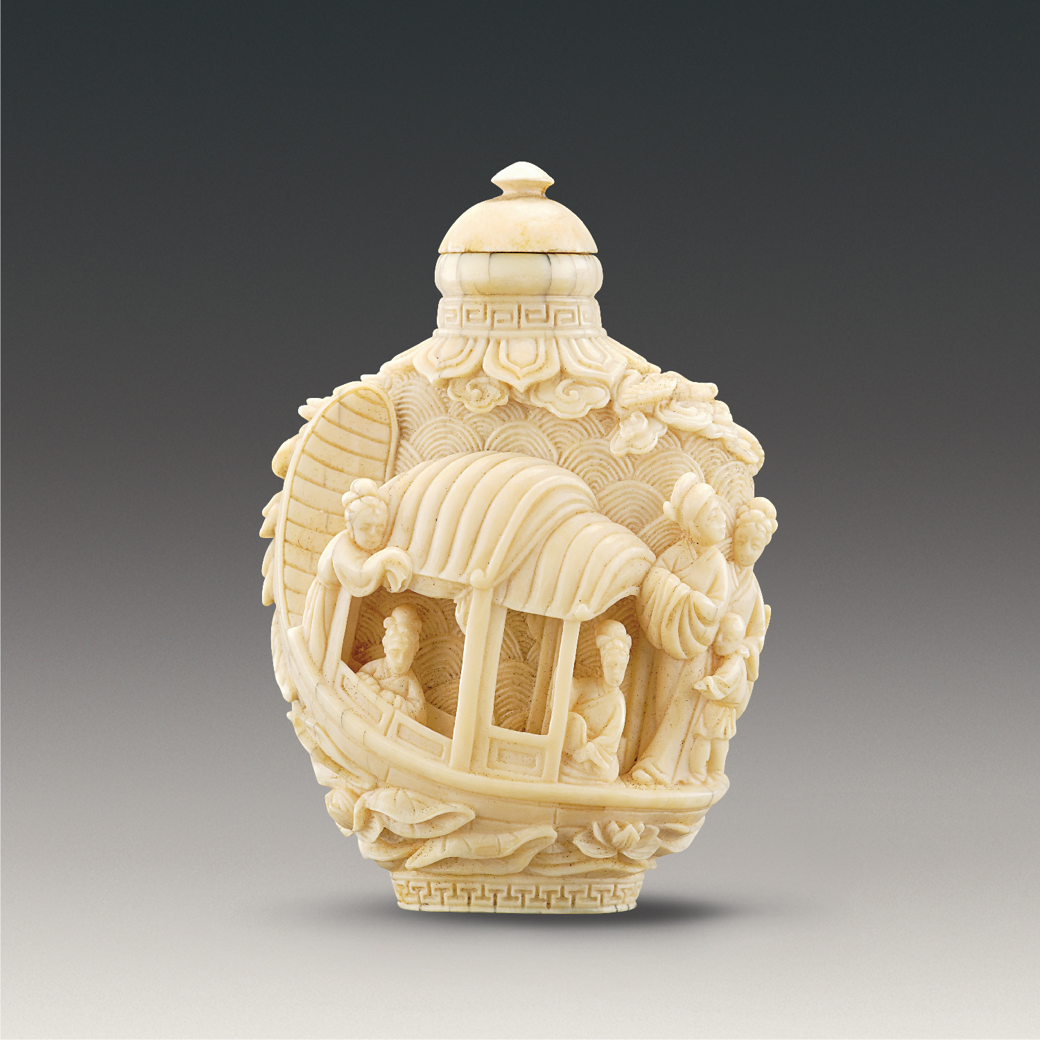 Ivory snuff bottle carved with figures on boat design in openwork
