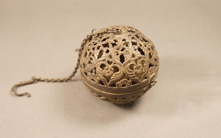 Silver spherical censer with floral scroll design in openwork