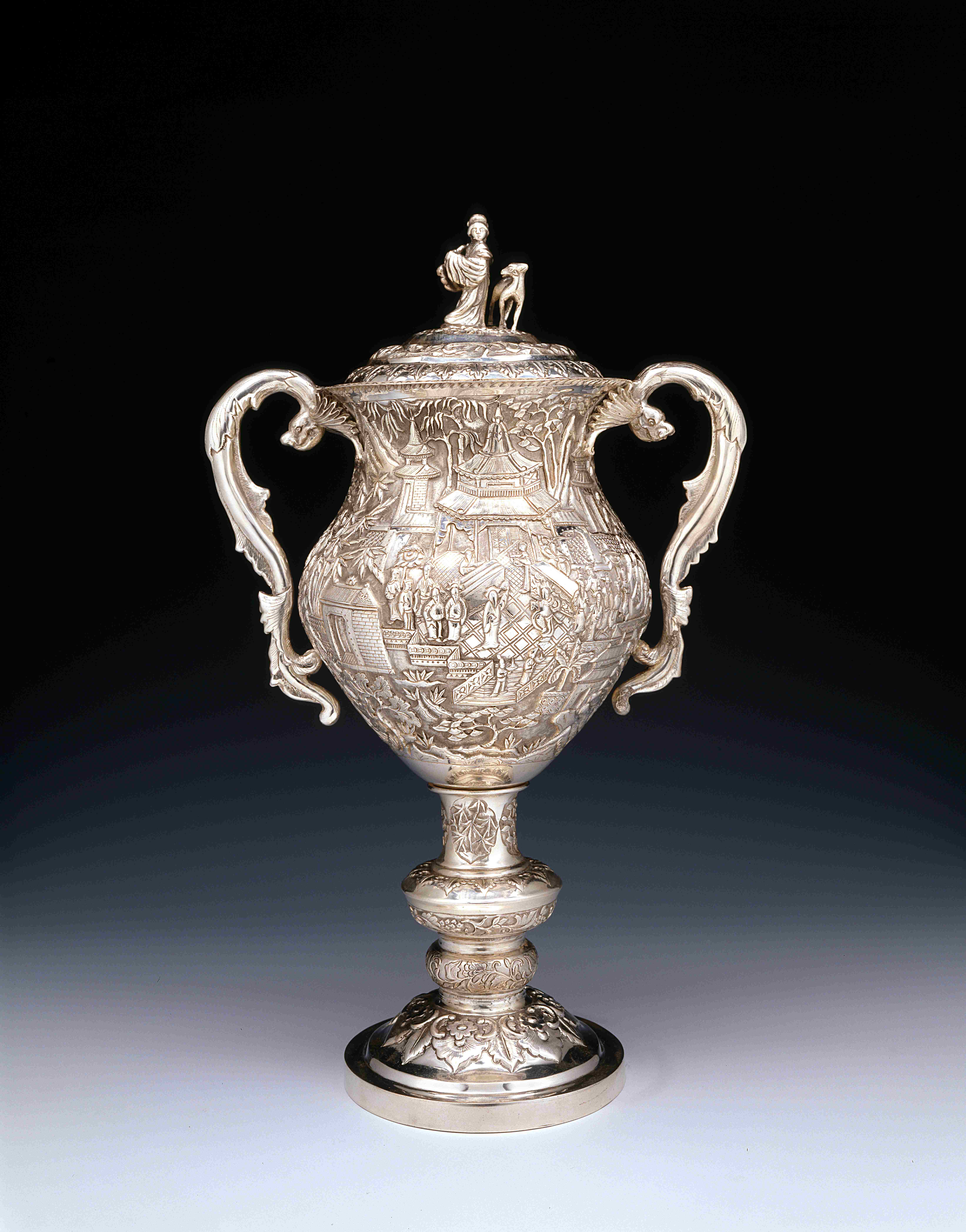 Silver standing cup with repoussé figures and flowers