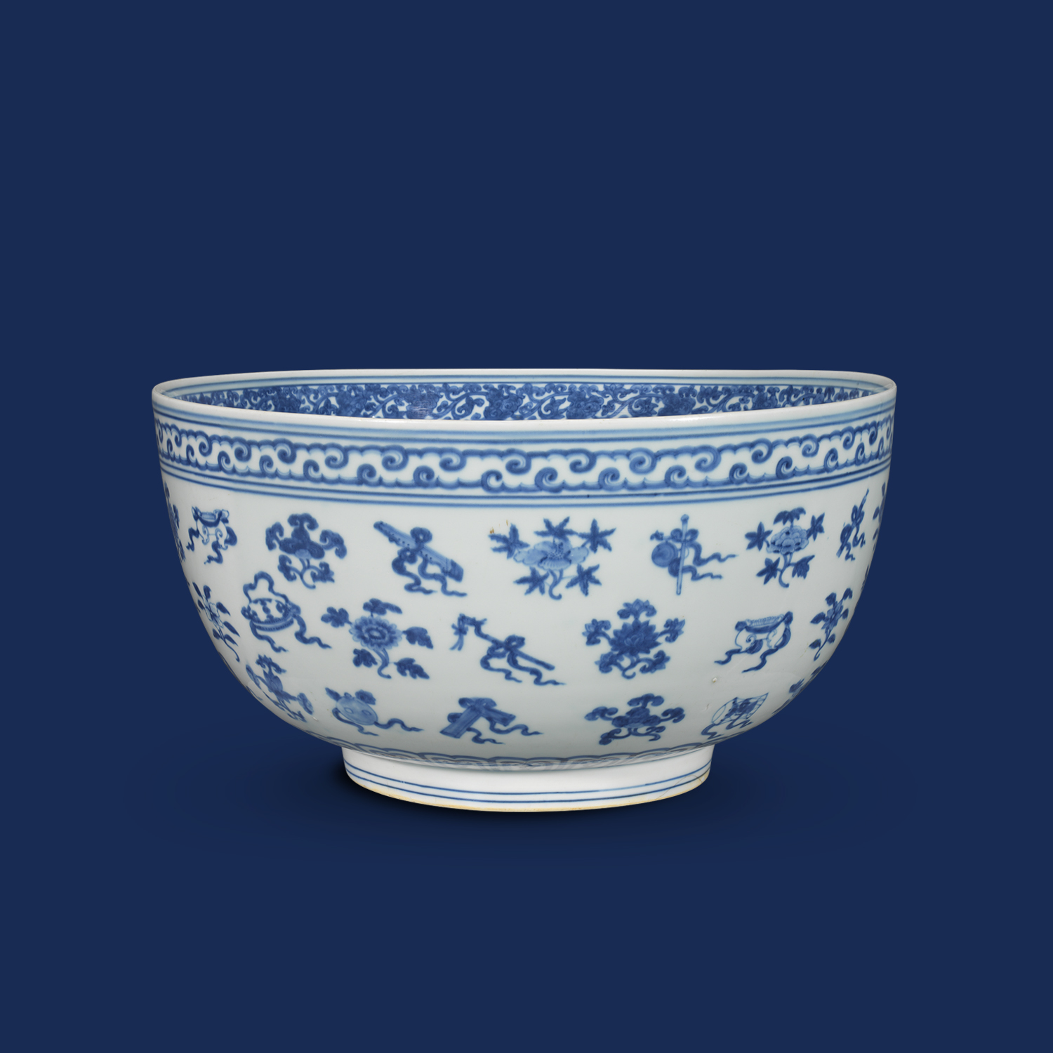Large bowl with assorted musical instruments design in underglaze blue