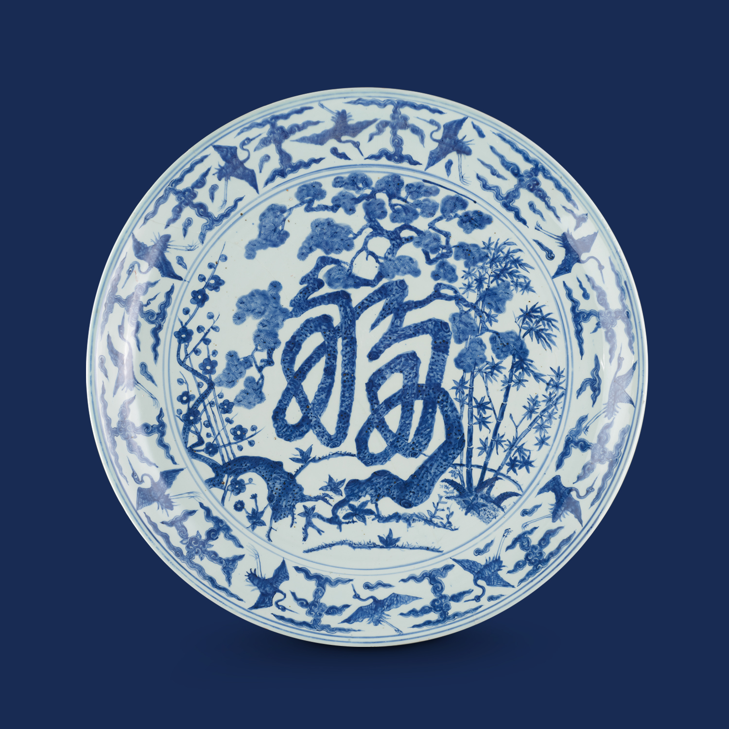 Charger with the Three Friends of Winter and <i>fu</i> character design in underglaze blue