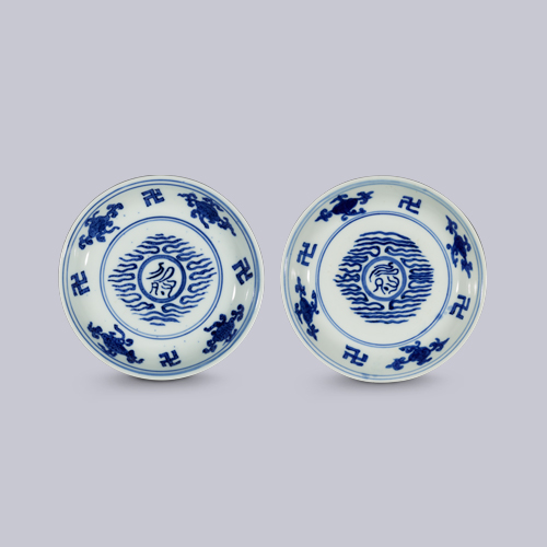 Pair of dishes with clouds and <i>shou</i> character in cloud script design in underglaze blue