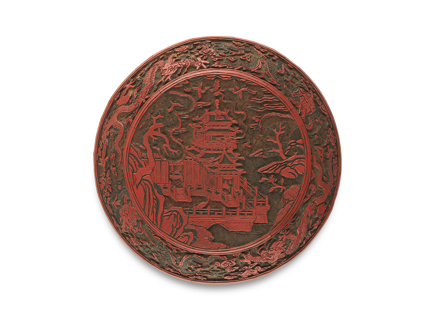 Red lacquer box carved with shou character and design of accumulating counters in an immortal abode<br> Six-character mark of Jiajing and of the period (1522 – 1566), Ming dynasty