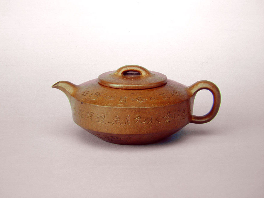 Teapot of Chamfered Low Cylindrical Shape